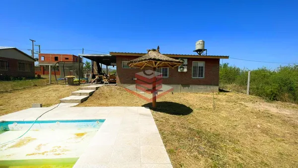 Casa en CASA EN VENTA EN BIALET MASSÉ, CON PISCINA AMPLIO PARQUE