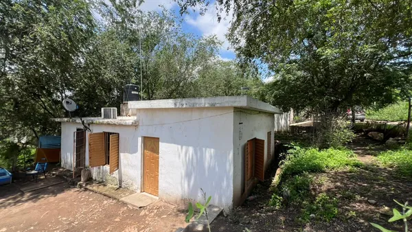 Casa en TRES PROPIEDADES EN BIALET MASSE A 100 MS RUTA 38 Y 300 DEL RIO COSQUIN. REF: 1949